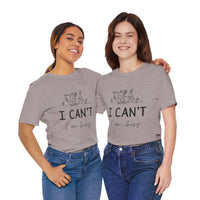 I Can’t, I’m Busy Unisex Jersey Short Sleeve TeeShow off your love for quiet moments with our I Can’t, I’m Busy Unisex Jersey Short Sleeve Tee. Perfect for book lovers and those who cherish their downtime, this tee features a playful illustration of a per