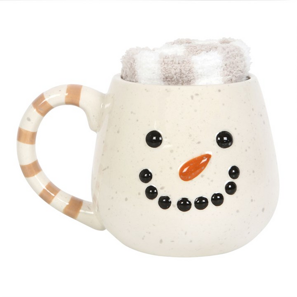 Snowman mug and socks set featuring a ceramic mug with a snowman design and cozy festive socks.