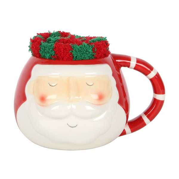 Santa mug and fluffy socks set for Christmas warmth and cheer.